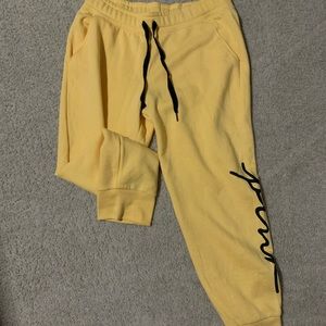 “Pink” brand yellow joggers